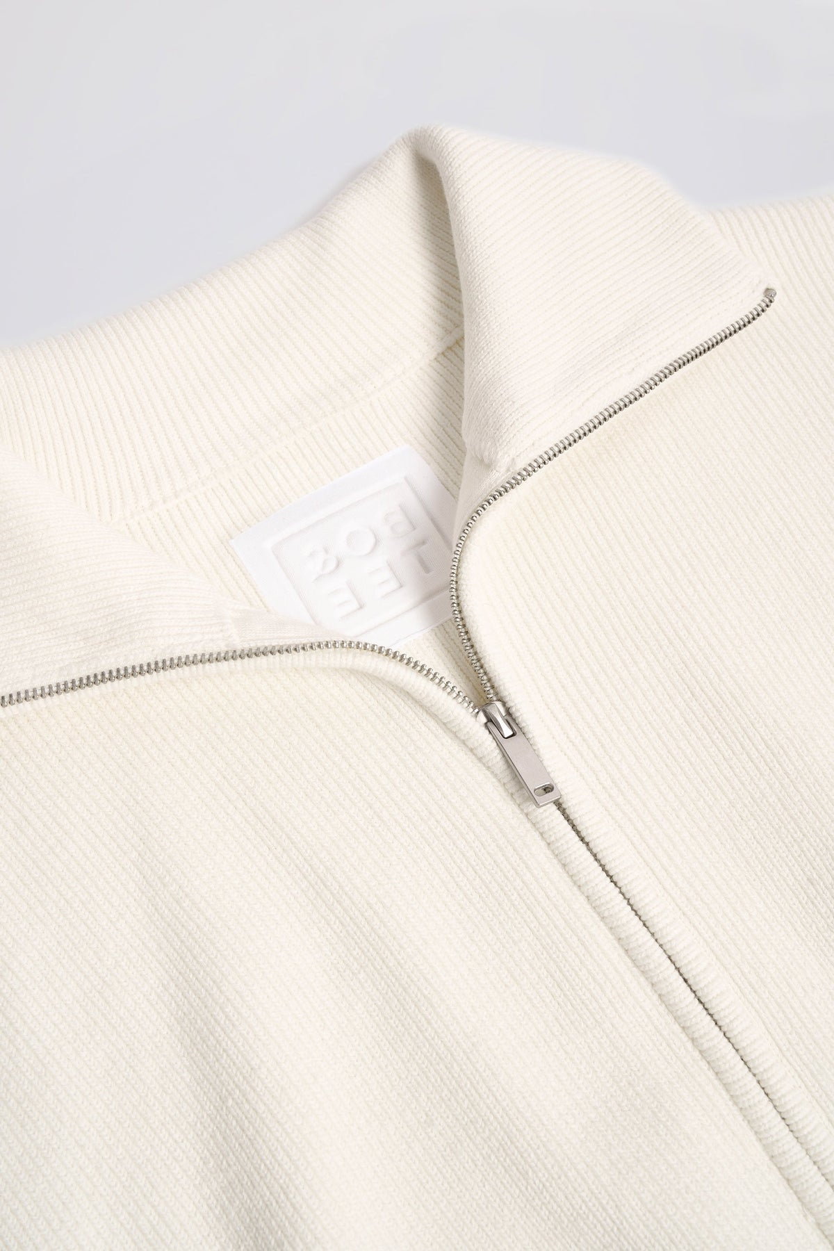 Ribbed Knit Zip-Up Cropped Sweatshirt in Ivory